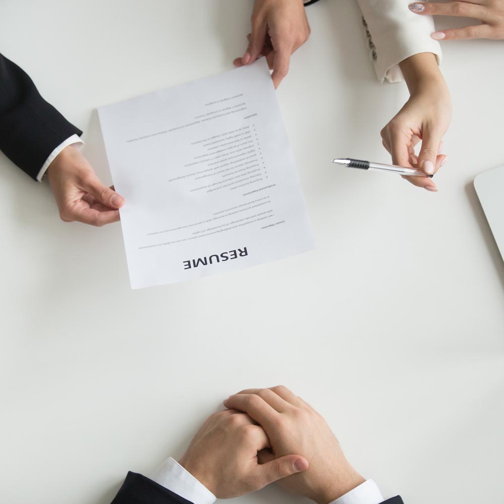 Hr managers reading applicants resume at job interview, recruiters or employers holding cv of vacancy candidate, employment and hiring negotiations, staff recruiting concept, top close up hands view